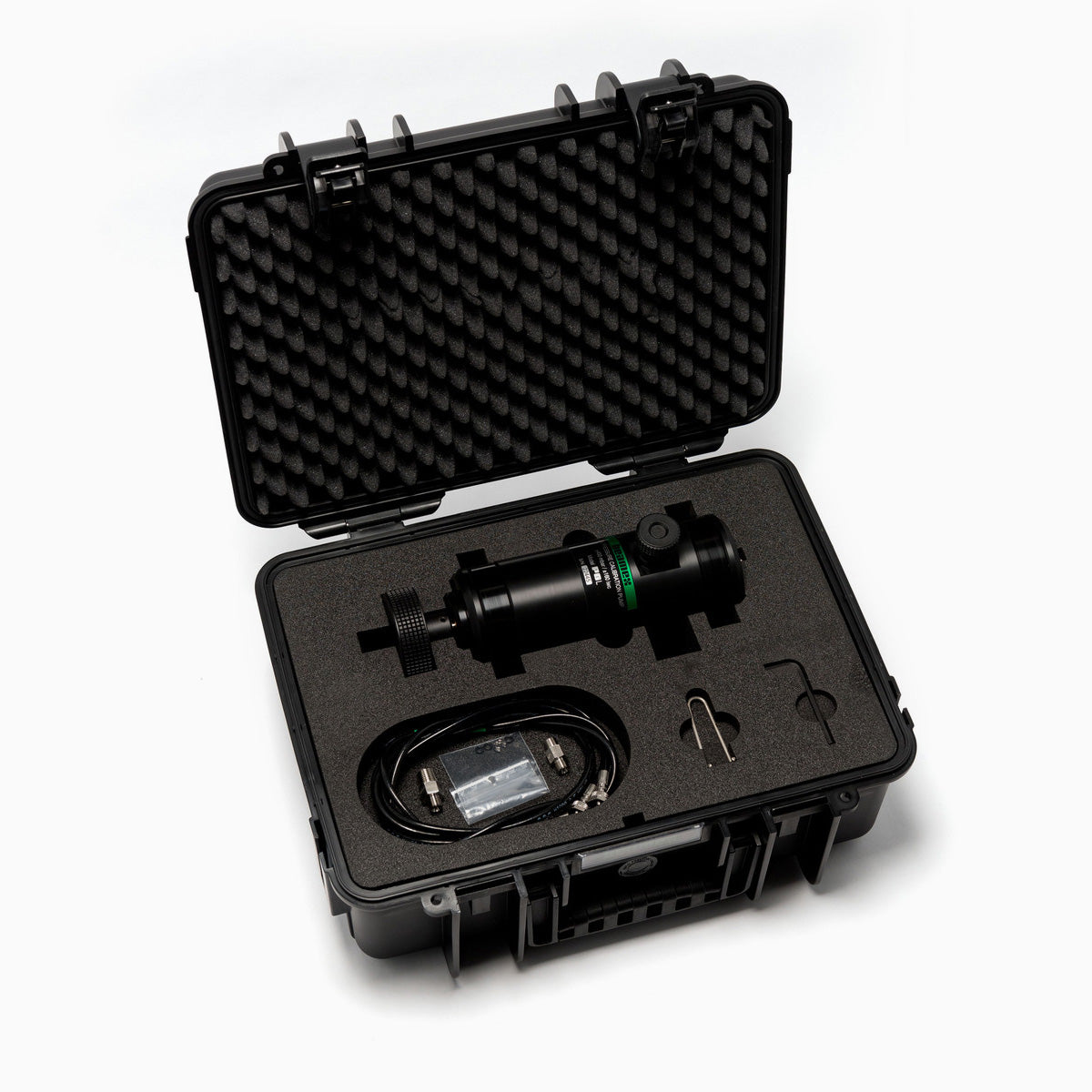 Black protective case with foam interior containing electronic components on a white background